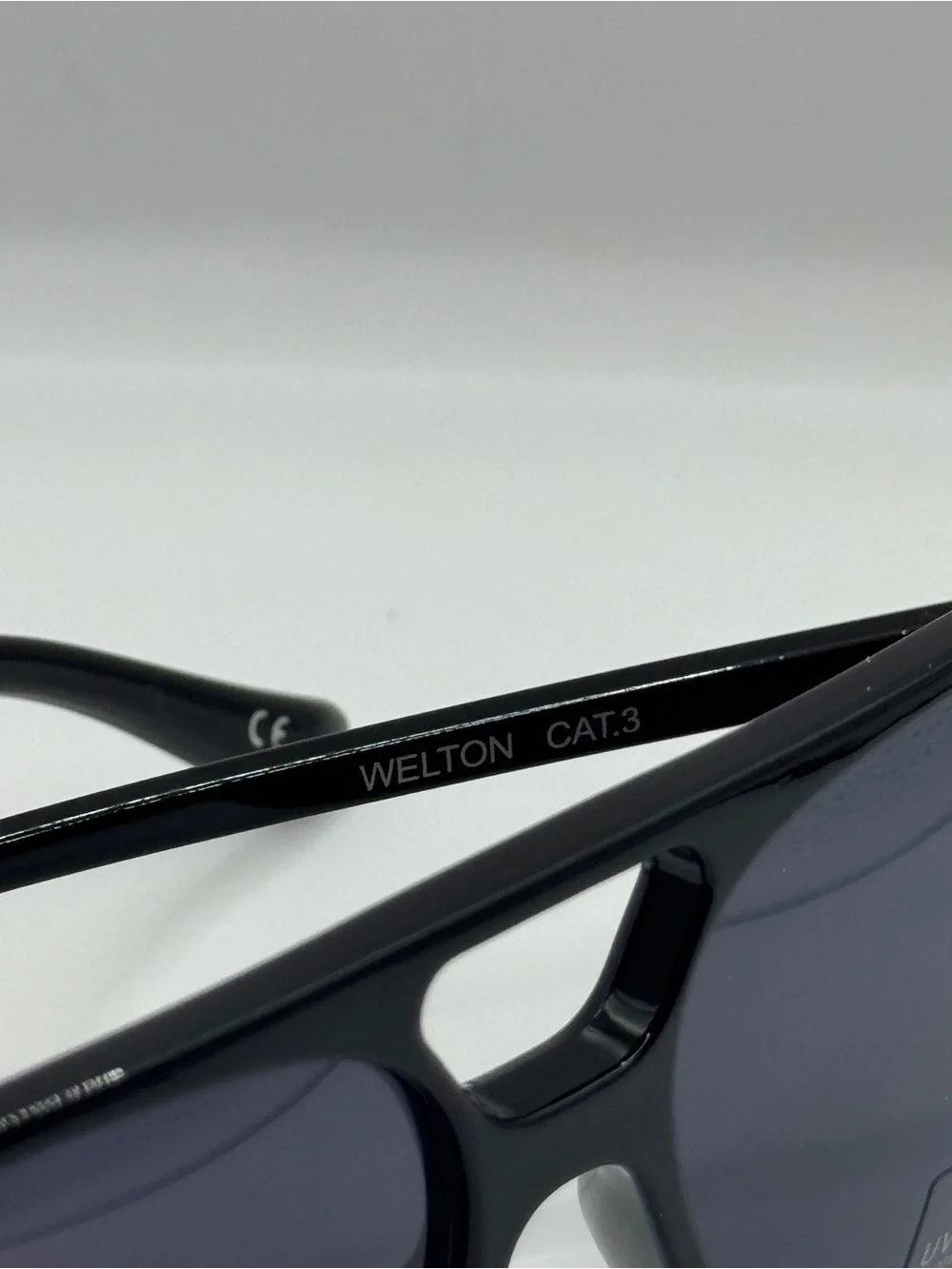 Vans Glossy Black Sunglasses with Blue-Tinted Lenses